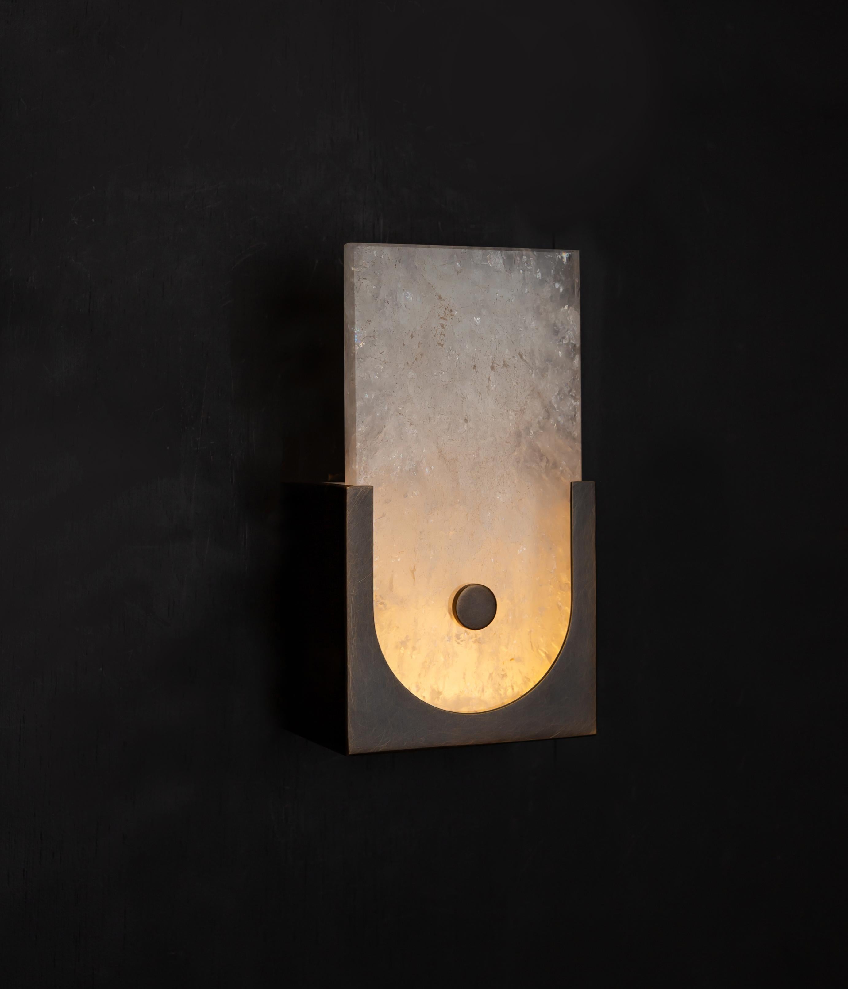 Quartz rock crystal cast in a solid brass frame with oil rubbed bronze finish.

Models in the collection are individually hand-crafted by the skilled artisans in our studio. Custom versions tailored to a specific setting are available by commission.