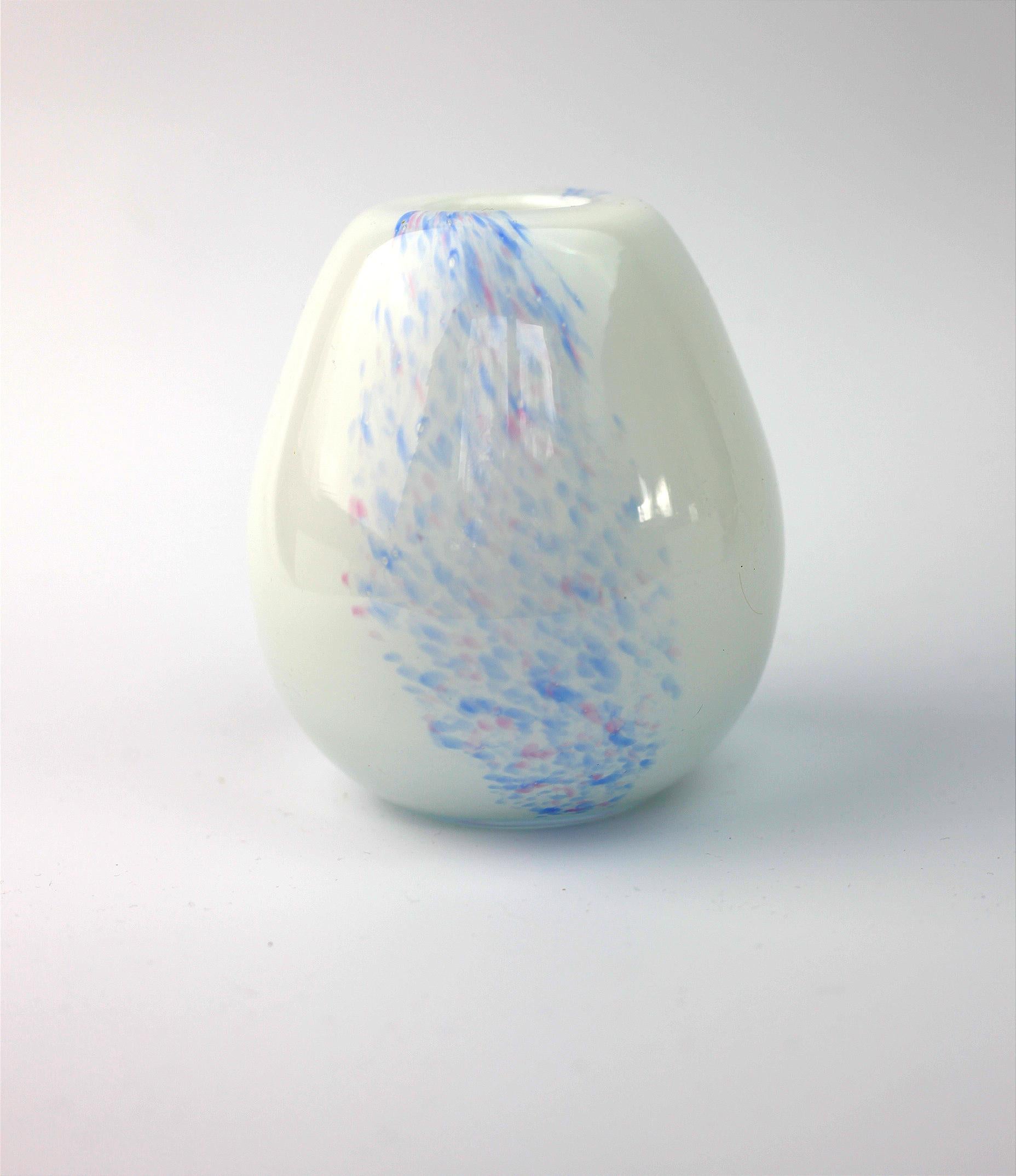 This Danish glass vase from the 'Reviera' series was designed by glassblower Kylle Svanlund and manufactured by Holmegaard in Denmark in 1976.