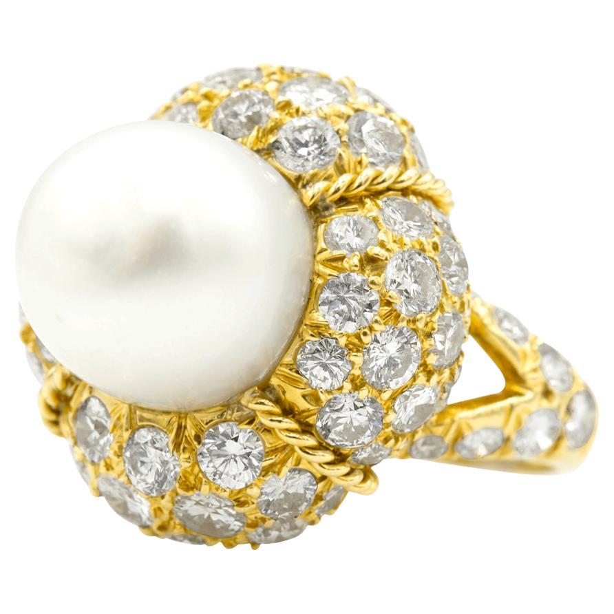 We love a good pearl moment. This super fine cocktail ring features a bold and beautiful natural pearl and a flurry of sparkling brilliant diamonds. This ring has some serious presence on the finger, and the pearl and diamond combination is a match