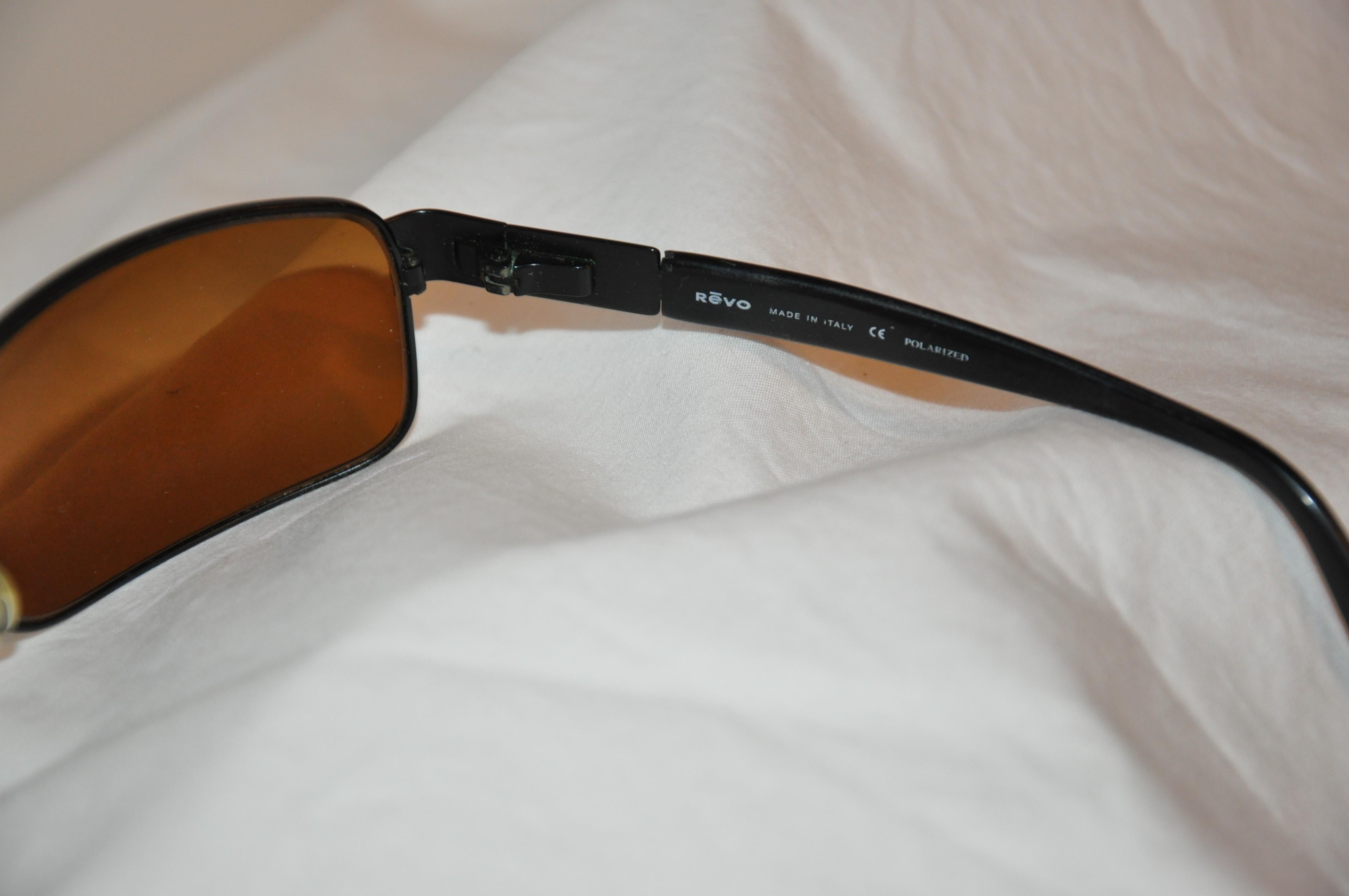 black curved sunglasses