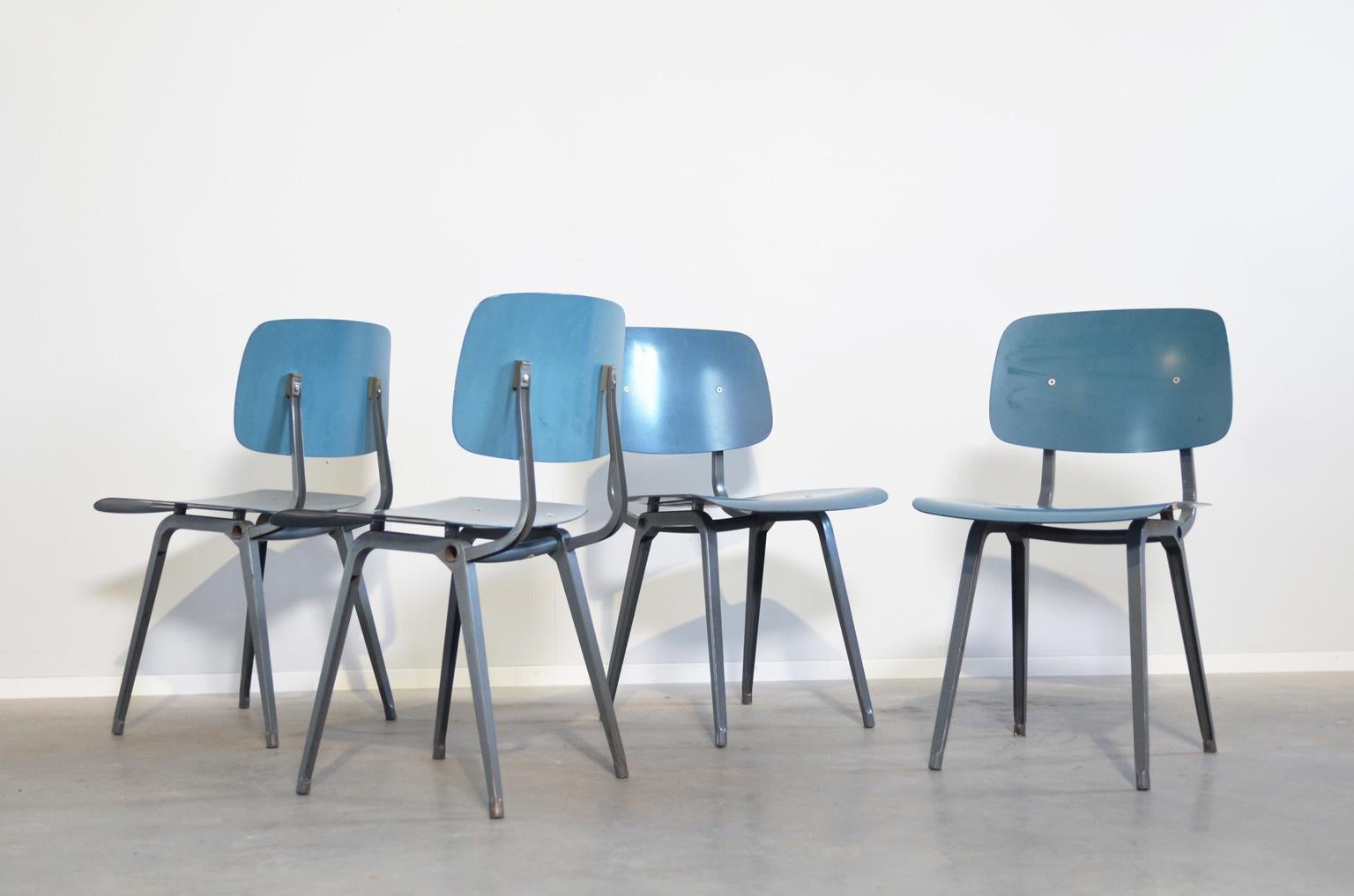 Revolt chairs in a warm color blue by Friso Kramer for Ahrend de Cirkel. A true design icon, which is still produced by Ahrend de Cirkel and highly appreciated among collectors. The chairs are marked under the seating. 