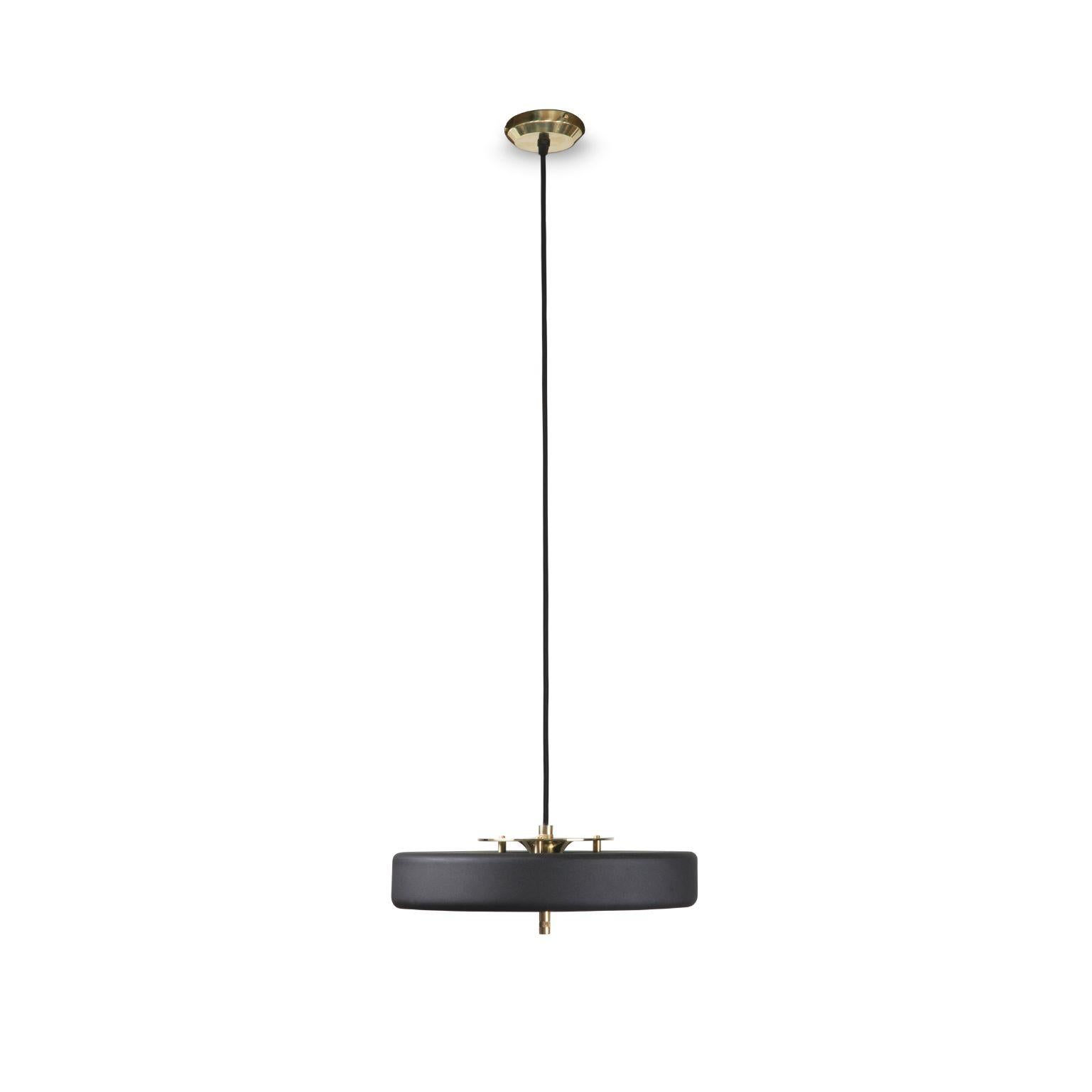 Revolve pendant light - brushed brass - black by Bert Frank
Dimensions: 60-200 x 35 x 11 cm
Materials: Brass, steel

When Adam Yeats and Robbie Llewellyn founded Bert Frank in 2013 it was a meeting of minds and the start of a collaborative creative