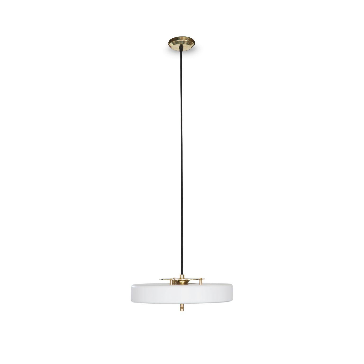 Revolve pendant light - brushed brass - white by Bert Frank
Dimensions: 60-200 x 35 x 11 cm
Materials: Brass, steel

Also available in polished brass

When Adam Yeats and Robbie Llewellyn founded Bert Frank in 2013 it was a meeting of minds