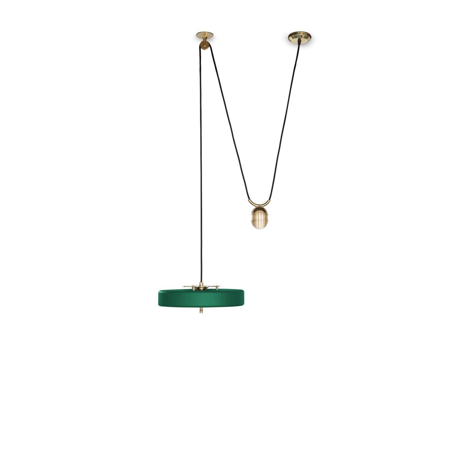 Revolve rise and fall pendant light - Brushed brass - Green by Bert Frank
Dimensions: 30 x 35 x 11 cm, small lamp 7.6 cm
Materials: Brass, steel

 
When Adam Yeats and Robbie Llewellyn founded Bert Frank in 2013 it was a meeting of minds and