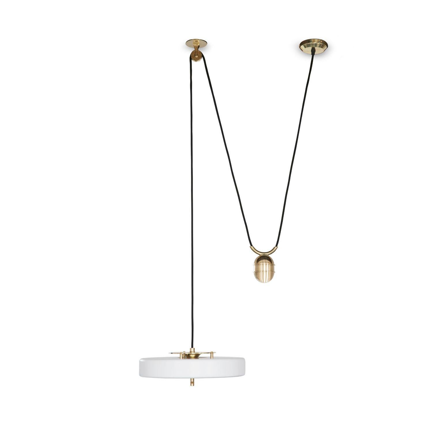 Revolve rise and fall pendant light - brushed brass - white by Bert Frank
Dimensions: 30 x 35 x 11 cm, small lamp 7.6 cm
Materials: Brass, steel

Also available in polished brass
When Adam Yeats and Robbie Llewellyn founded Bert Frank in 2013