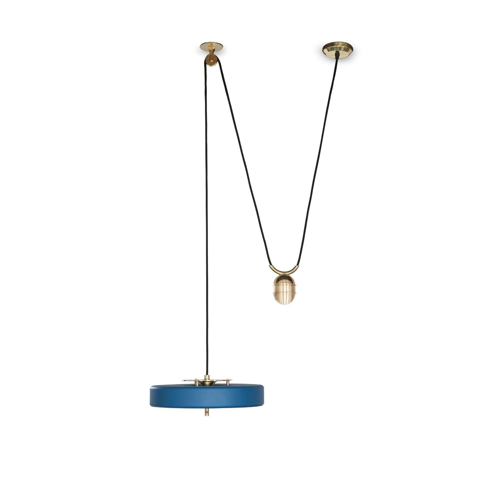 Revolve Rise and fall pendant light - Polished brass - Blue by Bert Frank
Dimensions: 30 x 35 x 11 cm, small lamp: 7.6 cm
Materials: Brass, steel

Also Available in brushed brass
When Adam Yeats and Robbie Llewellyn founded Bert Frank in 2013 it was