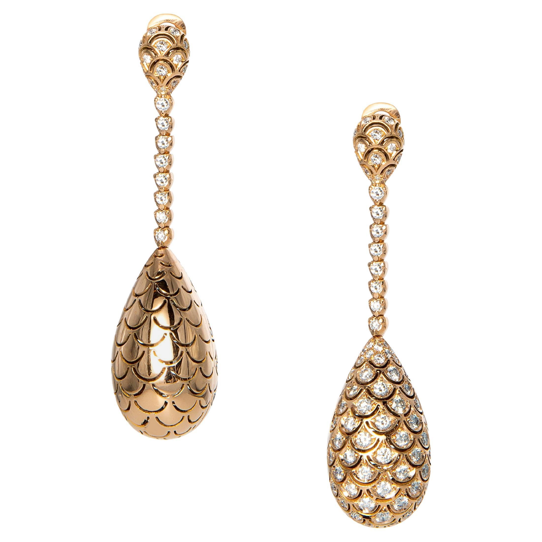 Orecchini Revolve in oro rosa con diamanti, modello double face