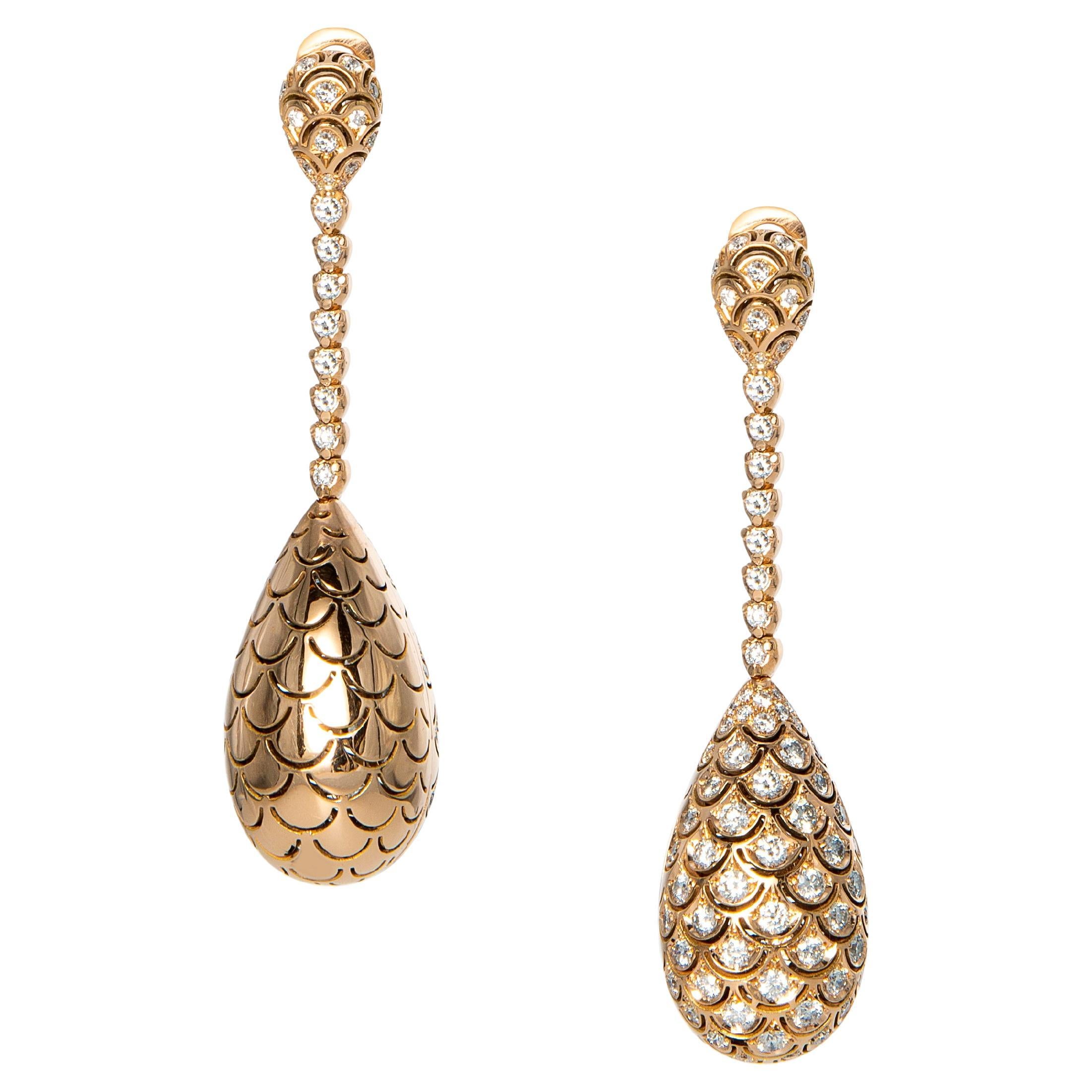 Boucles d'oreilles tourbillonnantes en or rose avec diamants, modèle double face en vente