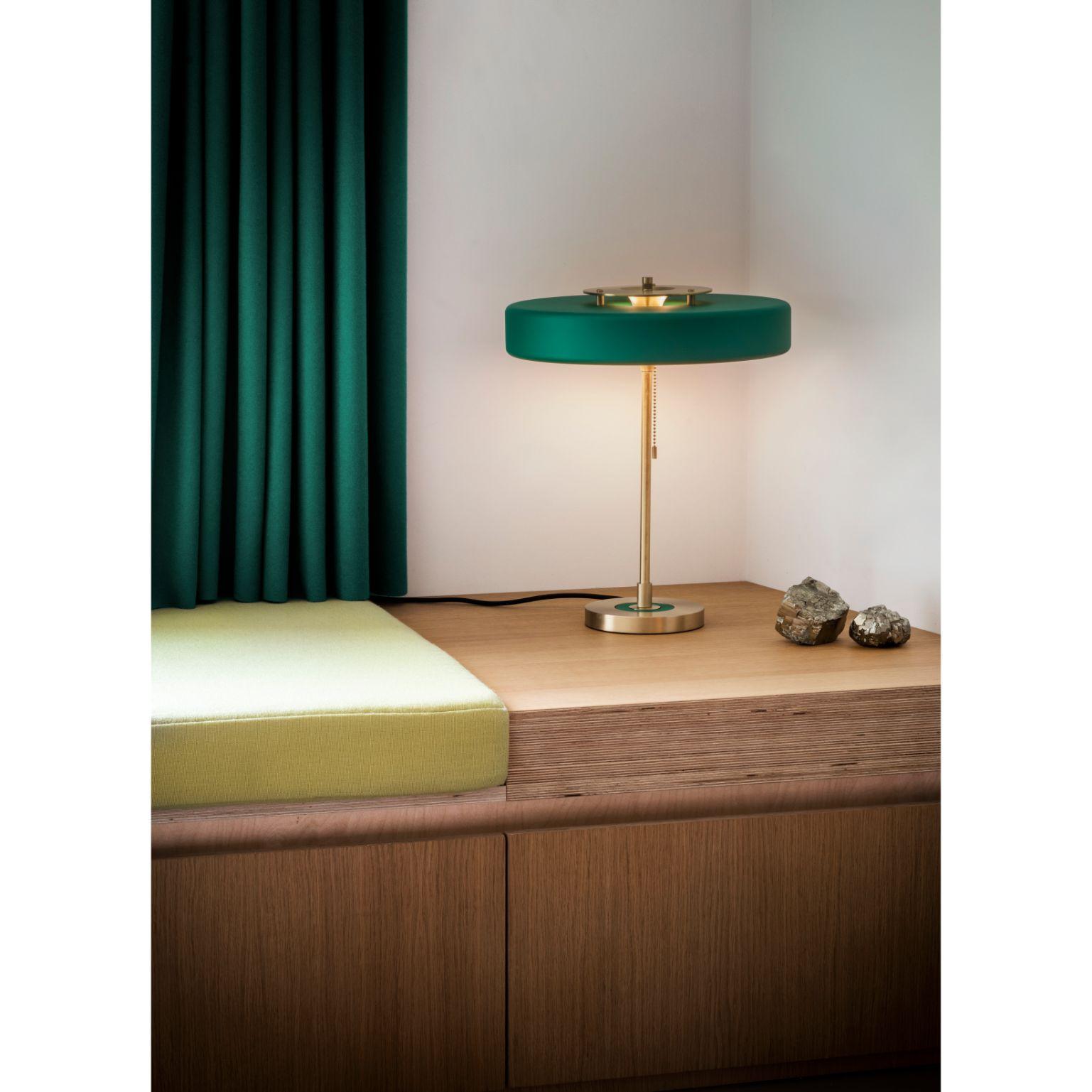 Revolve table lamp - brushed brass - green by Bert Frank
Dimensions: 42 x 35 x 15 cm
Materials: Brass, Steel

Also Available in polished brass

When Adam Yeats and Robbie Llewellyn founded Bert Frank in 2013 it was a meeting of minds and the start