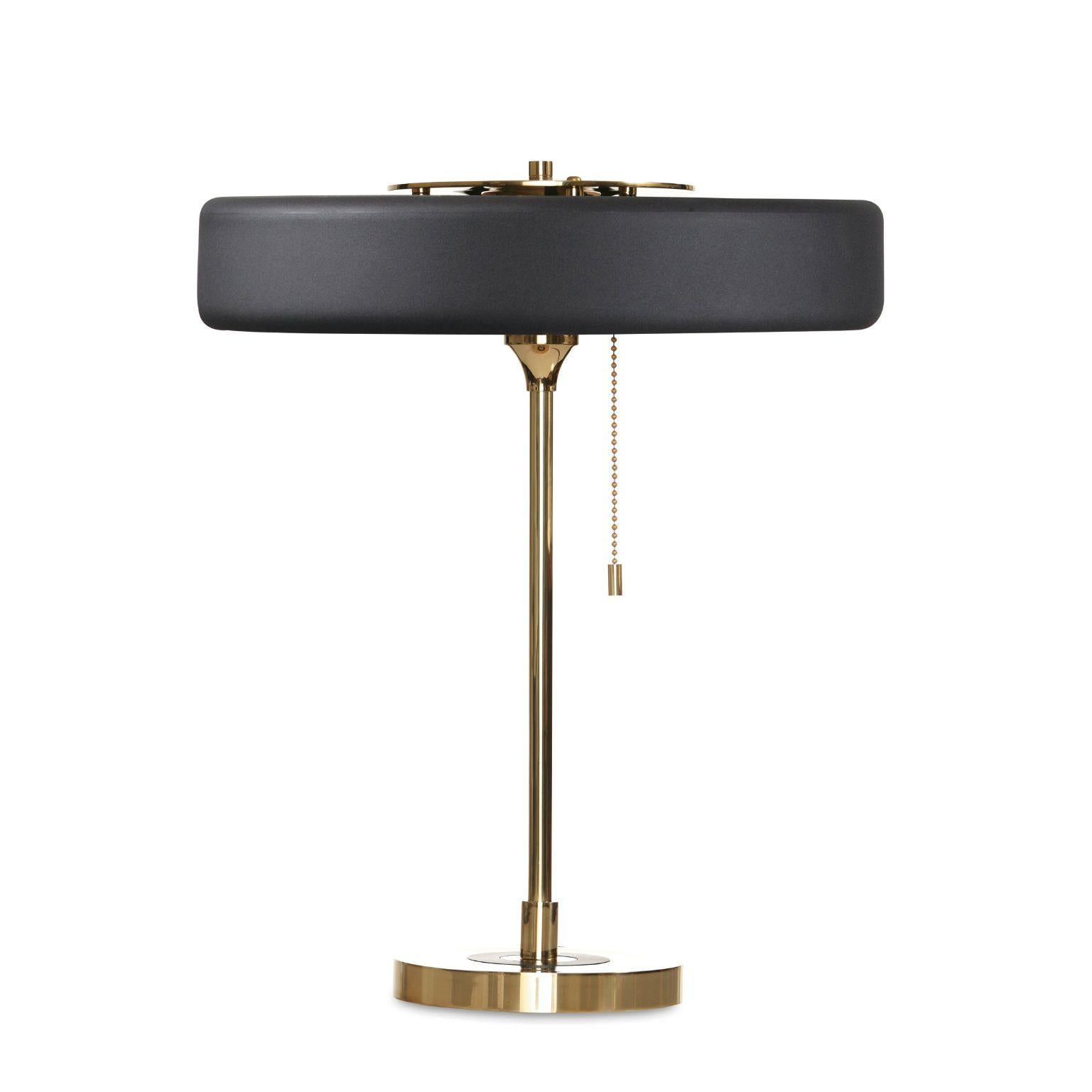 Revolve table lamp - Polished brass - Black by Bert Frank
Dimensions: 42 x 35 x 15 cm
Materials: Brass, Steel

Also available in brushed brass

When Adam Yeats and Robbie Llewellyn founded Bert Frank in 2013 it was a meeting of minds and the start
