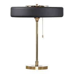 Lampada da tavolo Revolve, ottone lucido, nero di Bert Frank