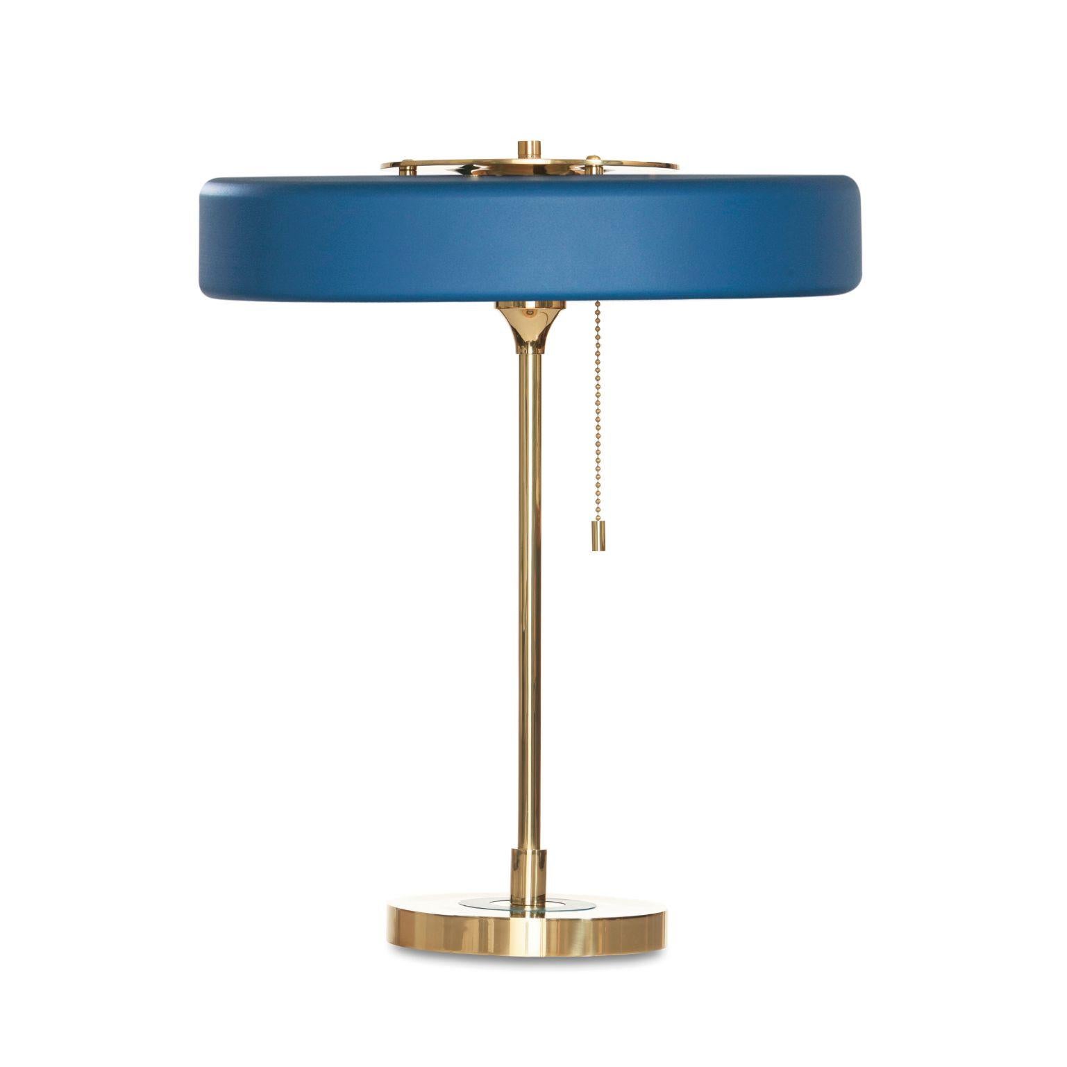Revolve table lamp - Polished brass - Blue by Bert Frank
Dimensions: 42 x 35 x 15 cm
Materials: Brass, steel

Also available in brushed brass

When Adam Yeats and Robbie Llewellyn founded Bert Frank in 2013 it was a meeting of minds and the start of