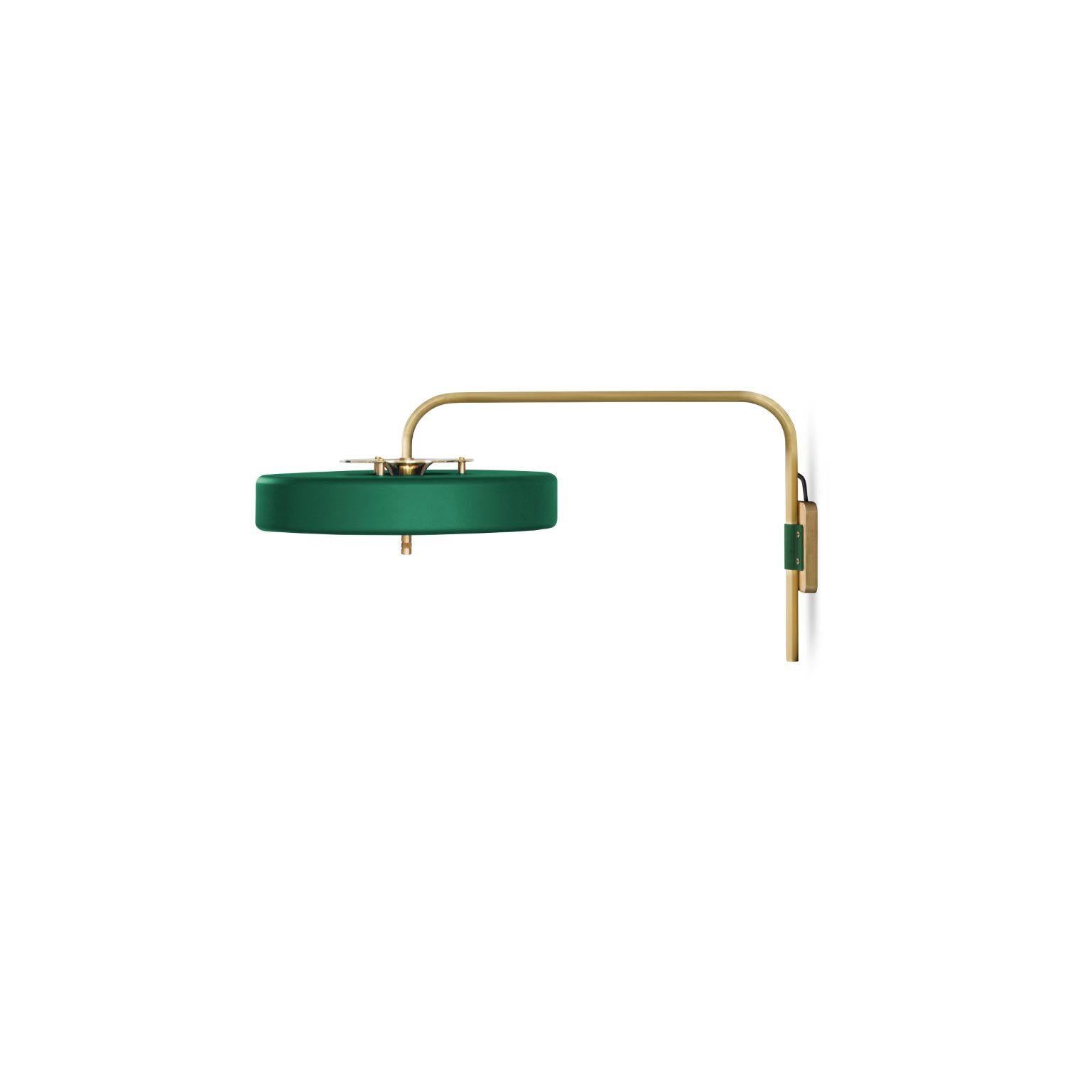 Revolve wall light - brushed brass - green by Bert Frank
Dimensions: 31 x 63 x 35 cm
Materials: Brass, Steel

Available in polished brass

Flush-fitting opal glass shade with central dome of polished marble – white Carrara or green Guatemala – held