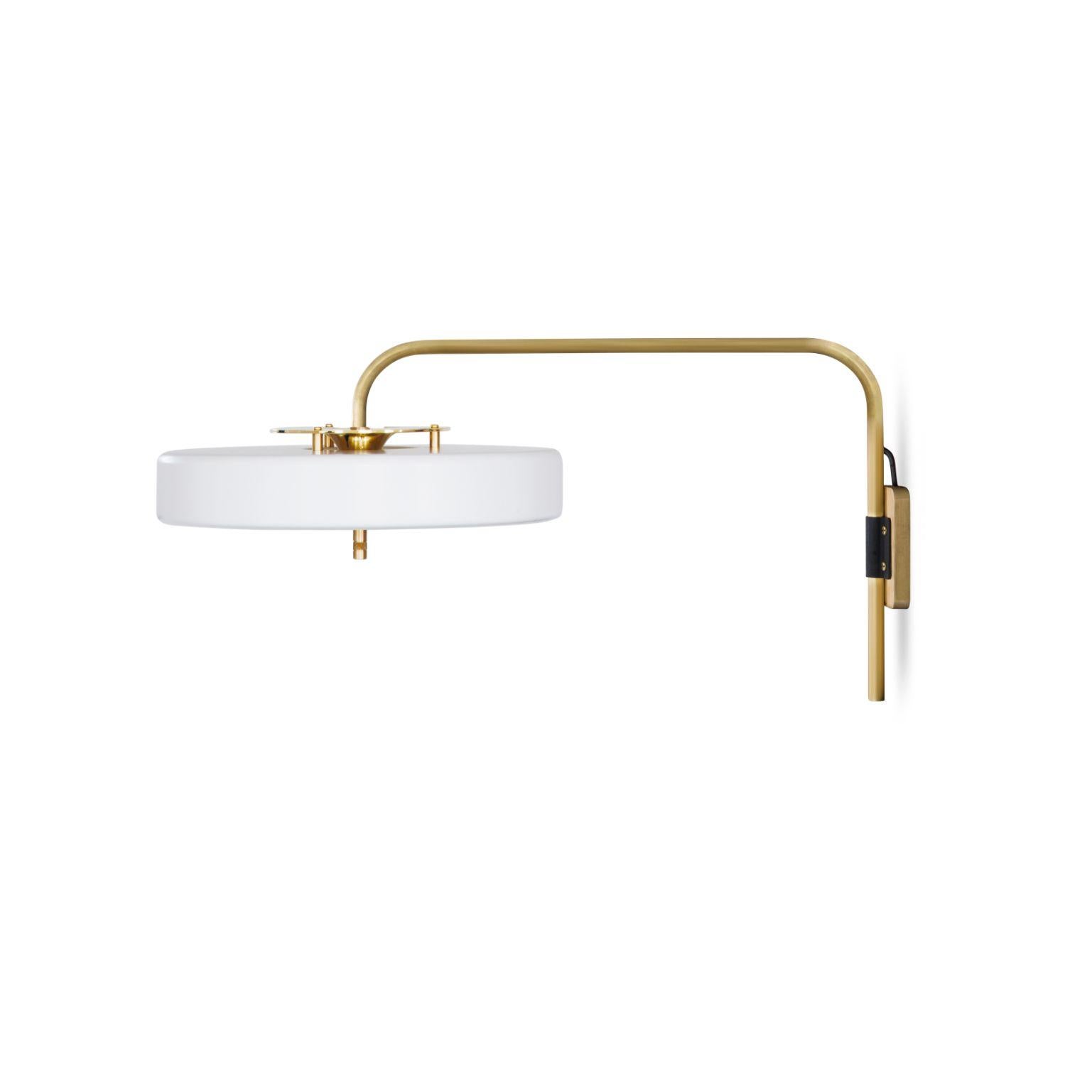 Revolve wall light - brushed brass - white by Bert Frank
Dimensions: 31 x 63 x 35 cm
Materials: Brass, steel

Available in polished brass

Flush-fitting opal glass shade with central dome of polished marble – white Carrara or green Guatemala –