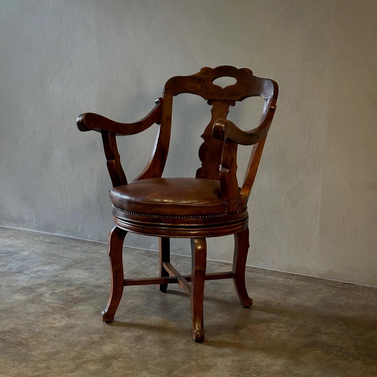 Italian Revolving Arm Chair by Luigi Filippo For Sale