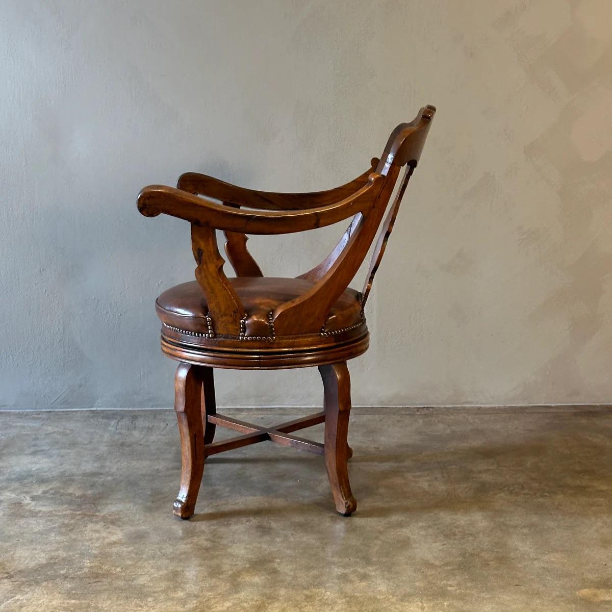 Walnut Revolving Arm Chair by Luigi Filippo For Sale