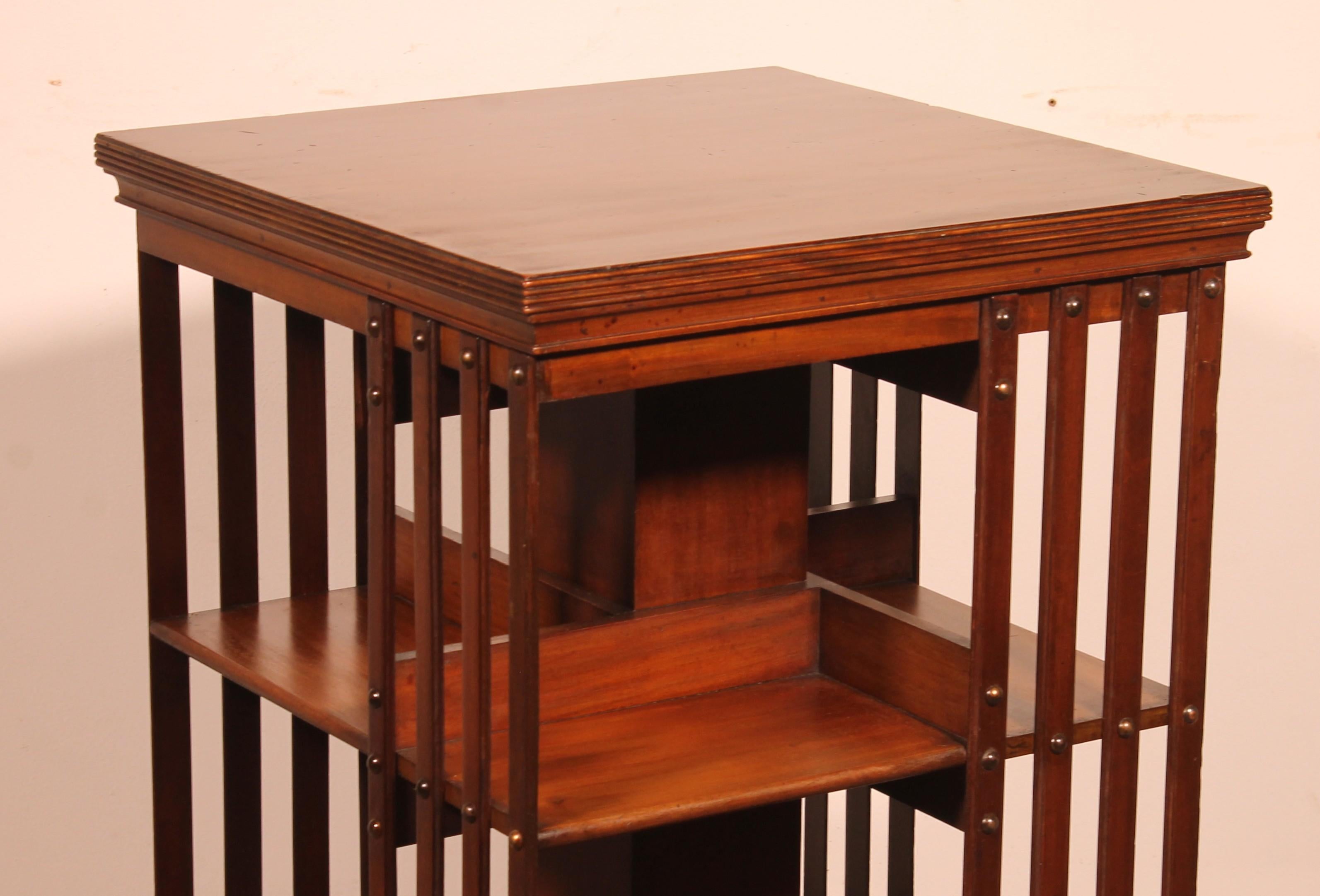 19th century mahogany revolving bookcase with iron base.
Lovely 19th century English bookcase with an iron base. Iron bases are the most sought after since the base is heavier and makes the bookcase more stable.

Beautiful quality bookcase entirely