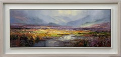 A serene moorland scene with rich hues, misty hills, and a reflective waterway