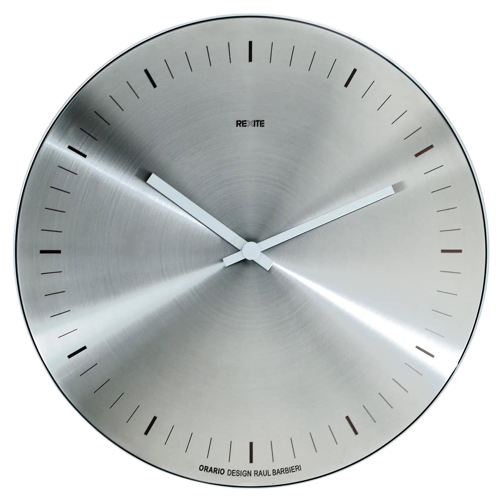 Rexite Orario - Reloj de pared de acero inoxidable (sin números)