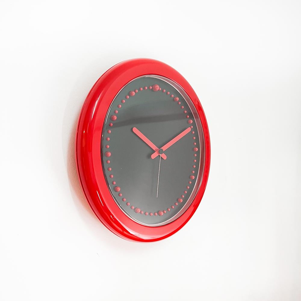 Rexite Zero 980 Wall Clock, 1981.

Designed by Studio Erre (Raul Barbieri and Giorgio Marianelli)

Acrylic plastic in red.

Working correctly with 1.5v LR14 Battery.

Measurements: 32x4 cm.