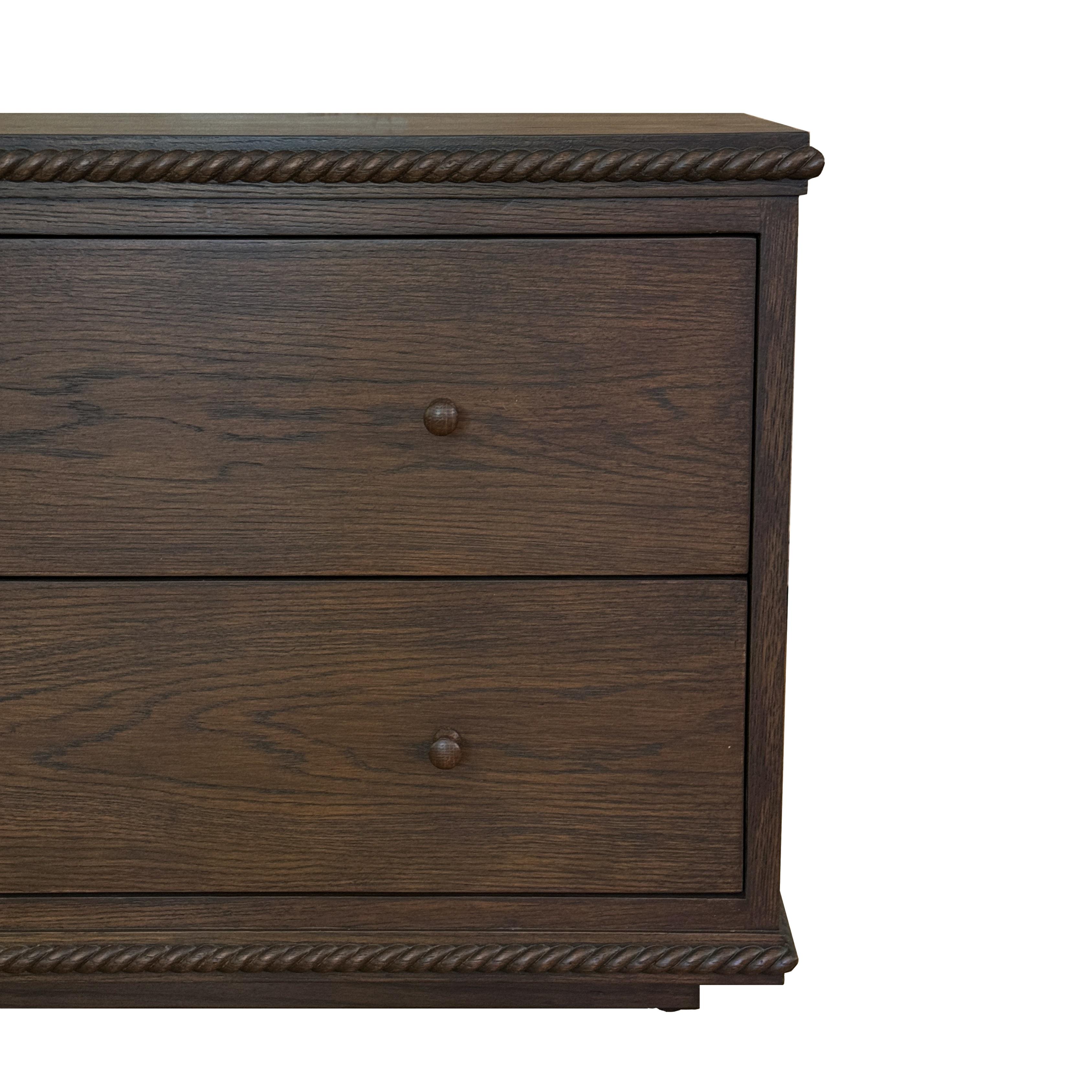 A low-profile nightstand or side table combining a classical twisted rope detail with clean-lined simplicity, featuring two drawers with dovetail joinery and soft-close glides. Inquire for customizations. 

Our Rey Collection conjures memories of a