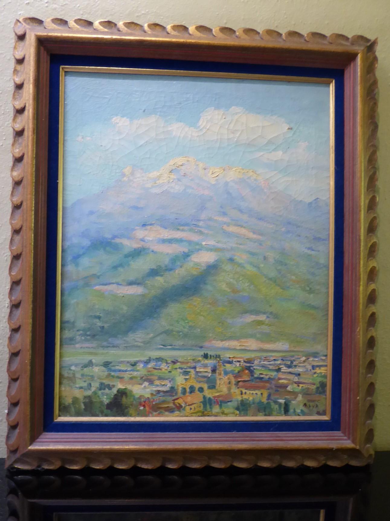 Vintage Reynaldo Maya (1911-Mexico) Landscape oil on canvas painting of Mexican town in the distance and  snow coverd mountains (volcanos) in the background. Bold brush strokes with a soft muted color palette. In the original hand carved