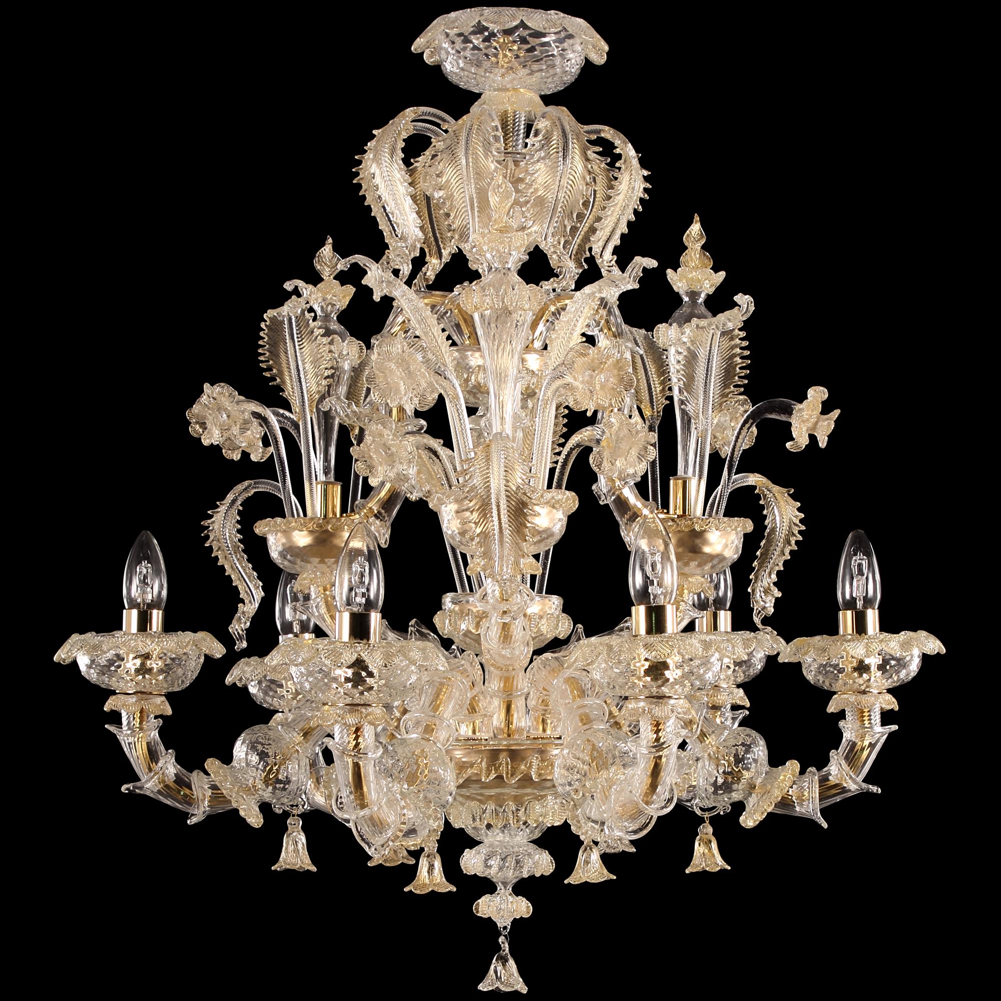 Caesar chandelier 6 arms, clear and gold, Murano glass, upper part with leaves by Multiforme
The name, as well as the structure evokes the splendour of the past centuries. It is an evergreen model, a Classic product manufactured by our skilled