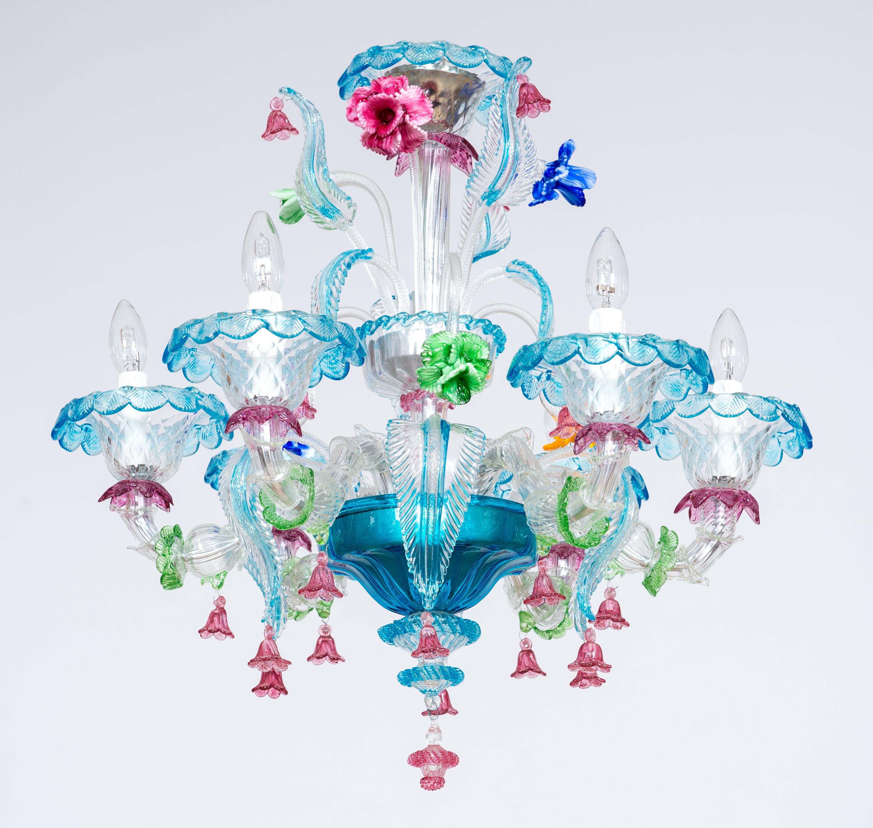 Rezzonico chandelier with Murano glass and glass paste flowers, Italy.
This chandelier is an outstanding example of the best Murano glass art. A garden of leaves and flowers spread out from two cups positioned at different heights. The leaves are