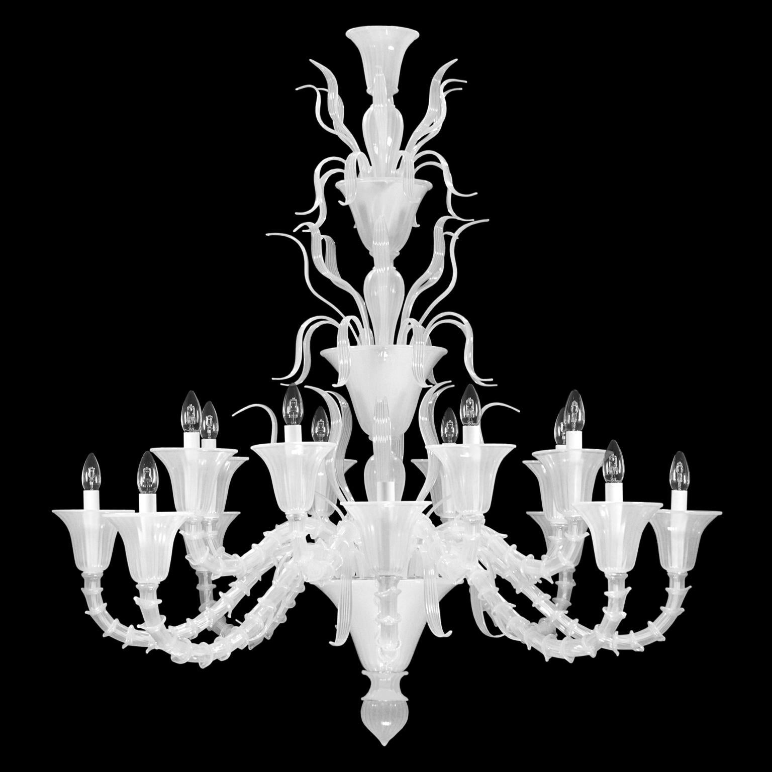 Fluage chandelier with 8+8 lights in silk Murano glass with rings by Multiforme

The blown glass chandelier Fluage is the perfect combination between the Venetian tradition and the most refined design. To manufacture the blown glass chandelier