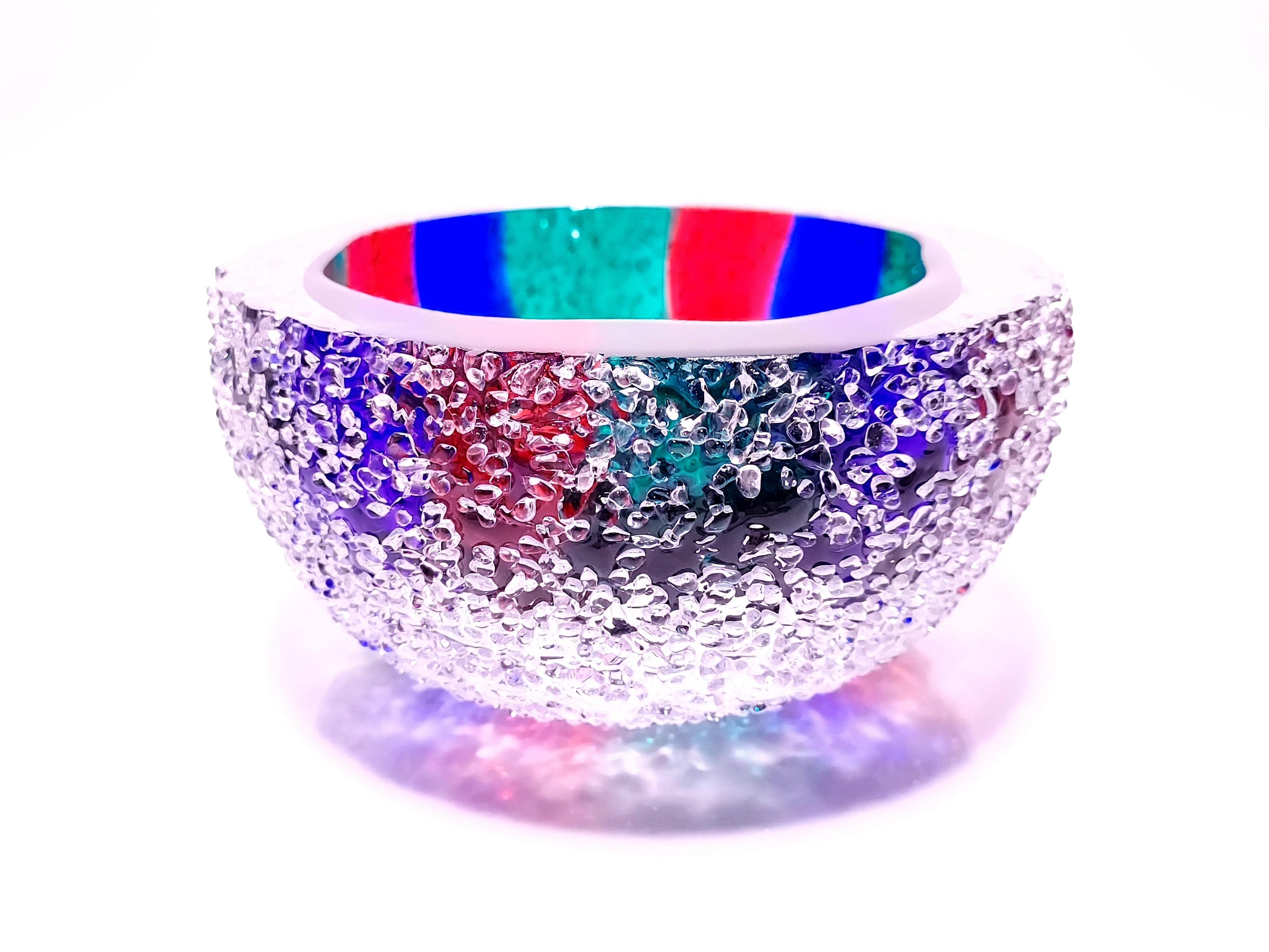 The RGB crystal color bowls are minimal color studies inspired by the classic Red Green Blue color sets used in digital and print media. After the large swaths of color are applied, we finish each bowl by complimenting the exterior with a coat of