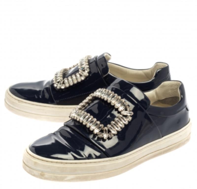 Let your latest shoe addition be this pair of slip-on Sneaky Viv sneakers from Roger Vivier. They've been crafted from patent leather in a blue hue and styled with embellishments on the uppers, comfortable leather insoles, and the brand logo