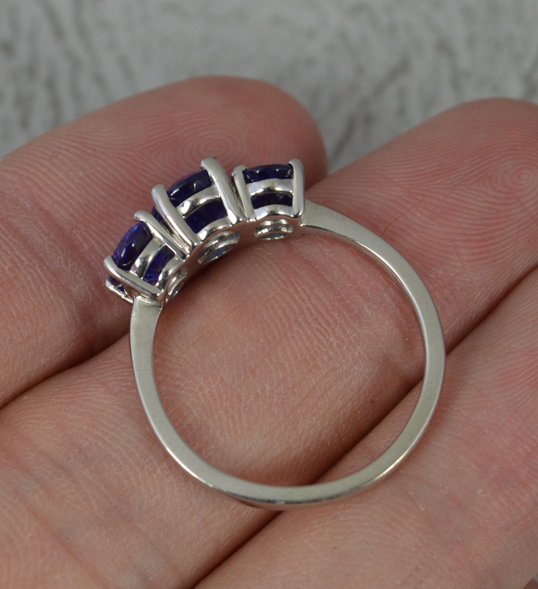 Oval Cut Rhapsody 3.25ct AAAA Tanzanite and Platinum Trilogy Ring