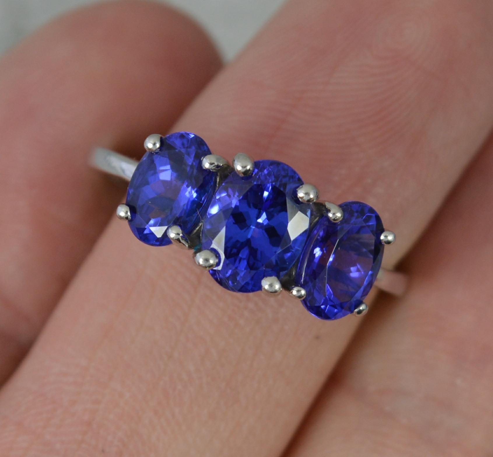 Rhapsody 3.25ct AAAA Tanzanite and Platinum Trilogy Ring In Excellent Condition In St Helens, GB