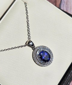 Rhapsody AAAA OVAL Tanzanite E-F VS Baguettes Diamonds 3.45ctw Platinum Pendant