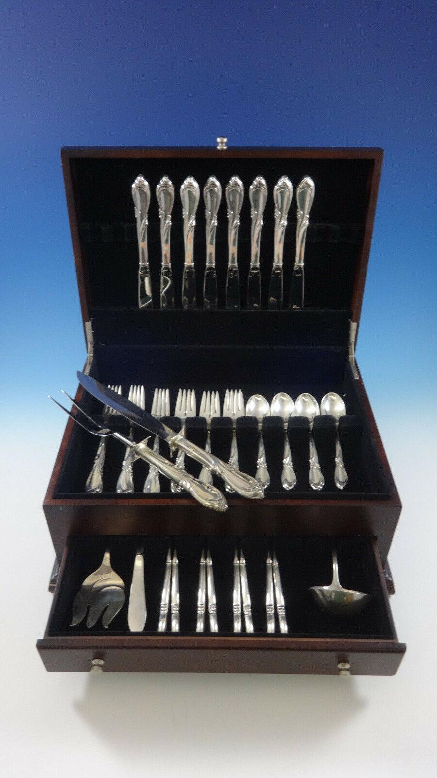 Rhapsody by International sterling silver flatware set - 44 pieces. This set includes:

8 knives, 9 1/4