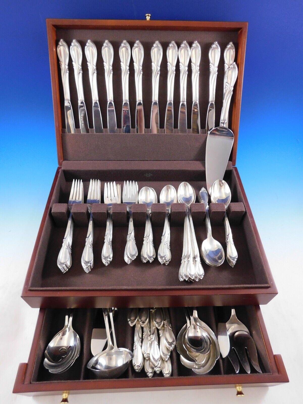 Rhapsody by International sterling silver Flatware set - 95 pieces. This set includes:
12 Knives, 9 1/4
12 Forks, 7 1/4