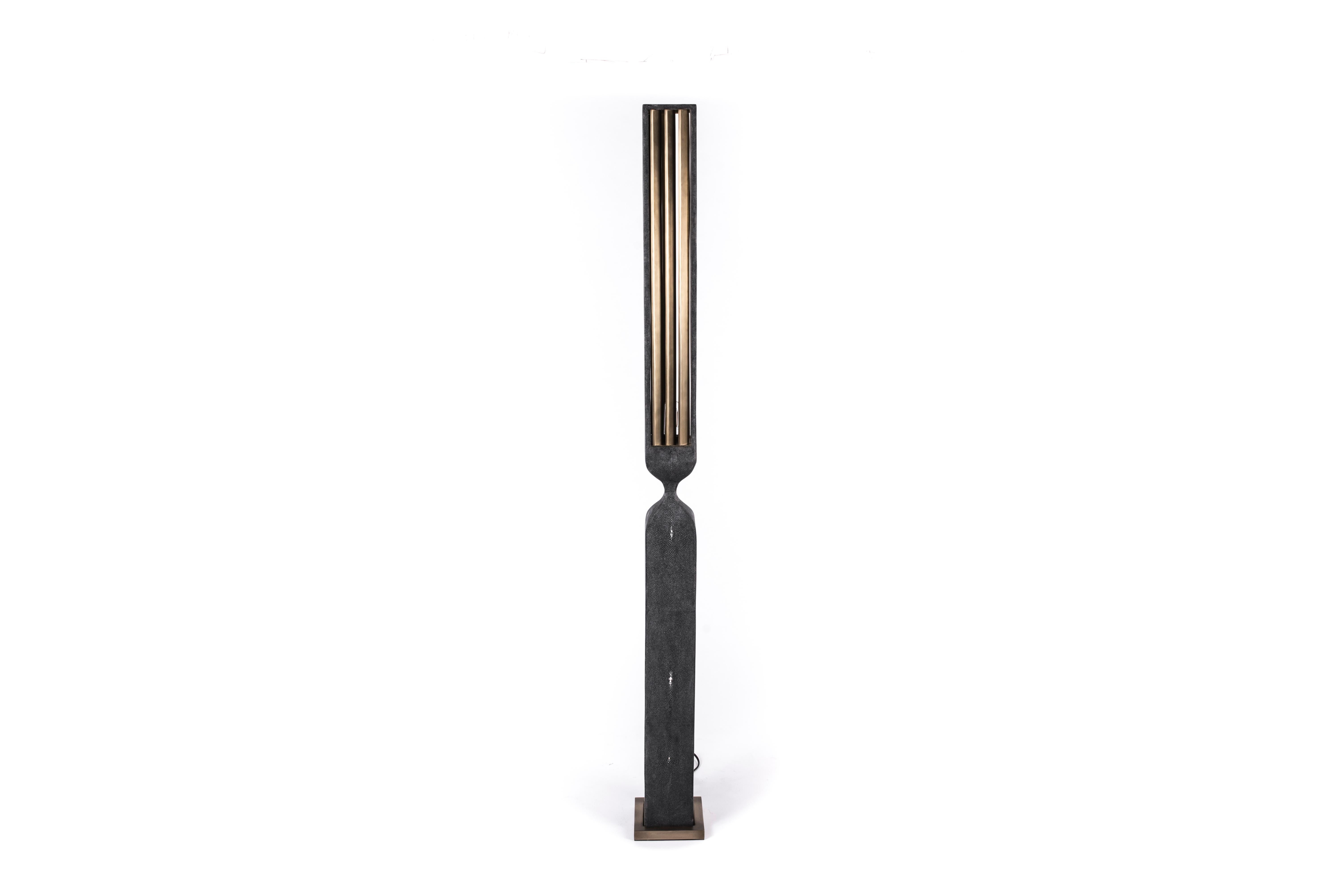 Patrick Coard Paris launches a unique and beautifully sculptural lighting collection inspired by music as a continuation of his candle line. The Rhapsody floor lamp in bronze-patina brass and coal black shagreen is an ethereal and sculptural piece.