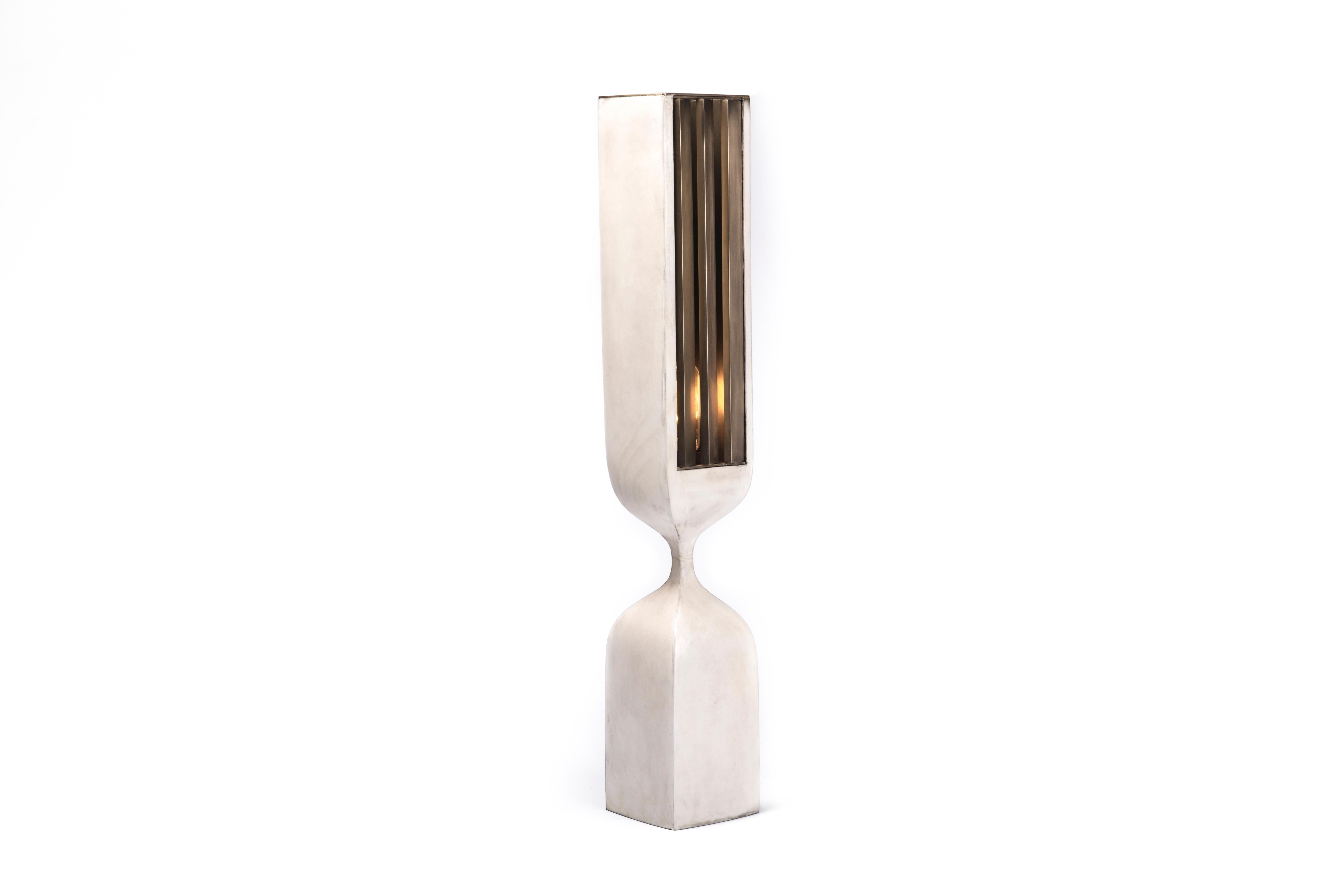 Patrick Coard Paris launches a unique and beautifully sculptural lighting collection inspired by music as a continuation of his candle line. The Rhapsody table lamp in bronze-patina brass and cream parchment is an ethereal and sculptural piece. The