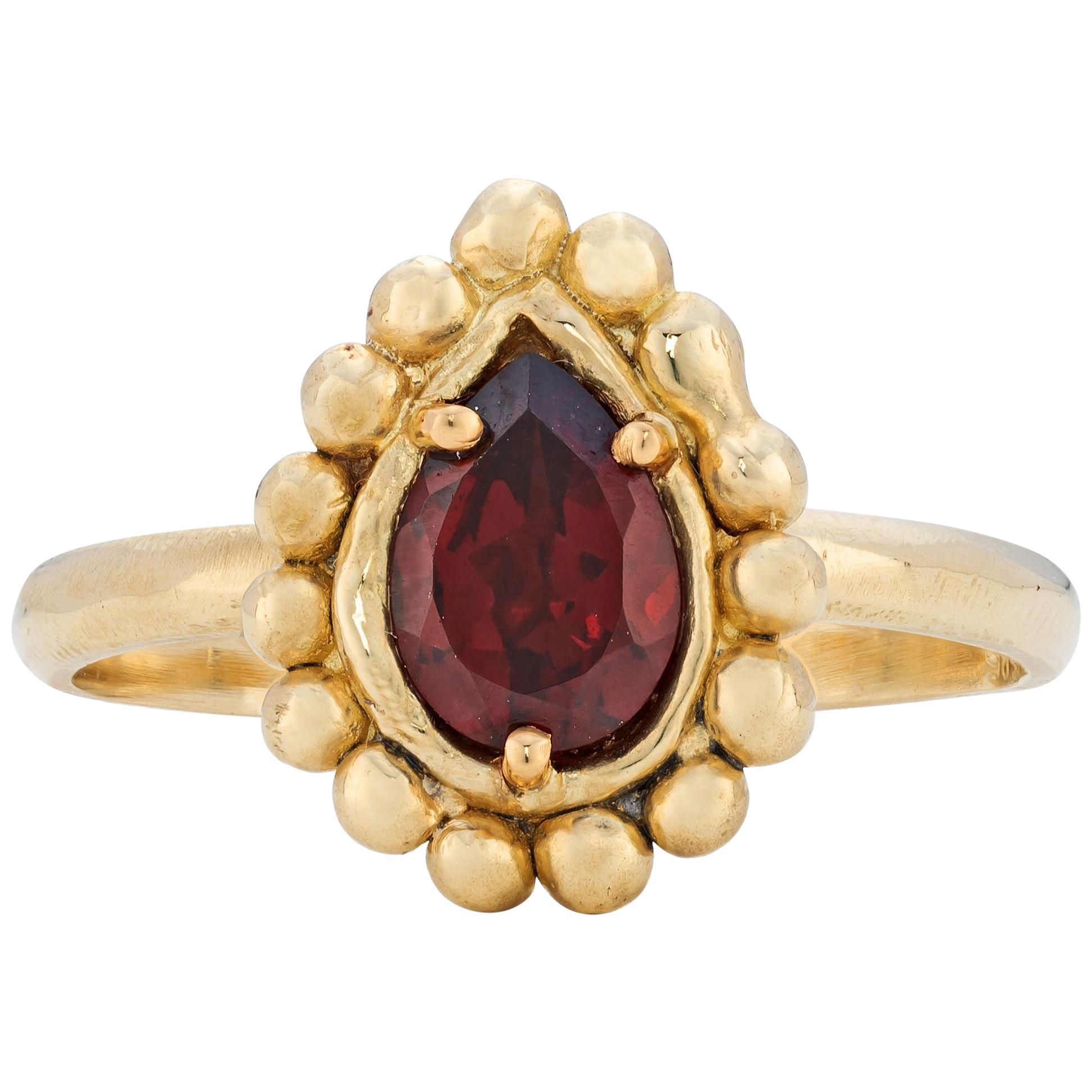 Rhea Ring with Garnet, 18 Karat Yellow Gold For Sale