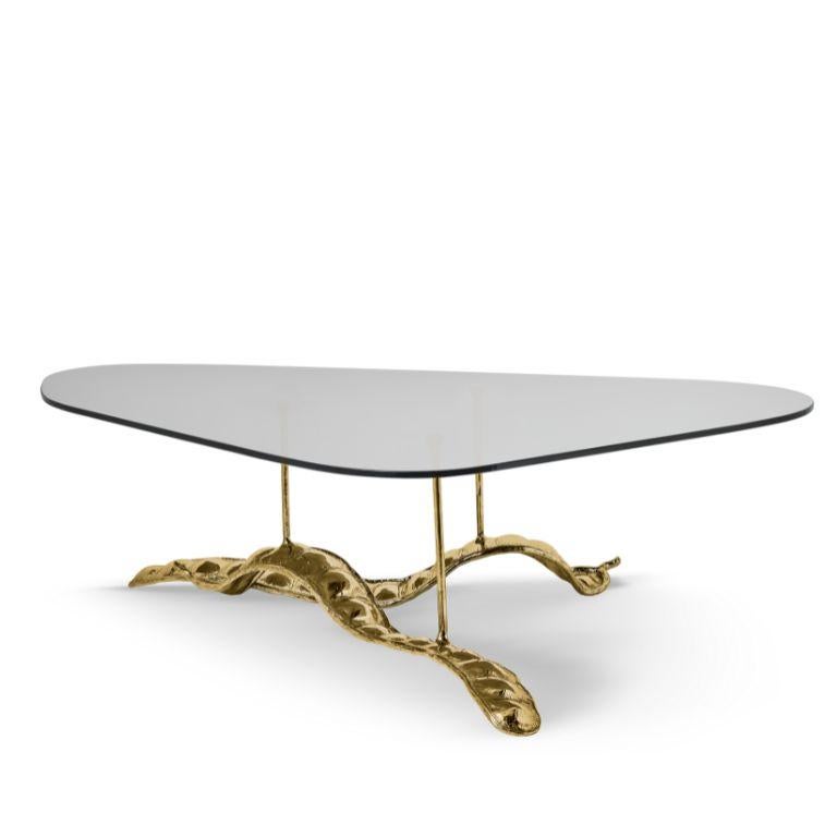 Immerse yourself in the epitome of luxury with Rheedi, a true masterpiece that effortlessly fuses organic inspiration with contemporary elegance. Crafted with meticulous artistry, this exquisite center table draws inspiration from the graceful