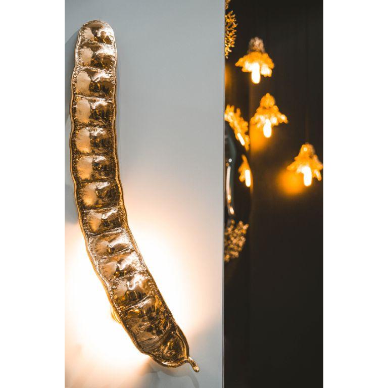 Lámpara de Pared Rheedi: Iluminación de latón pulido con elegancia orgánica y sofisticación Latón en venta