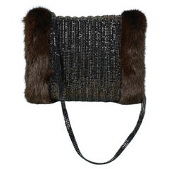 Rhinestone and mink muff with rhinestone strap Daniel Swarovski 