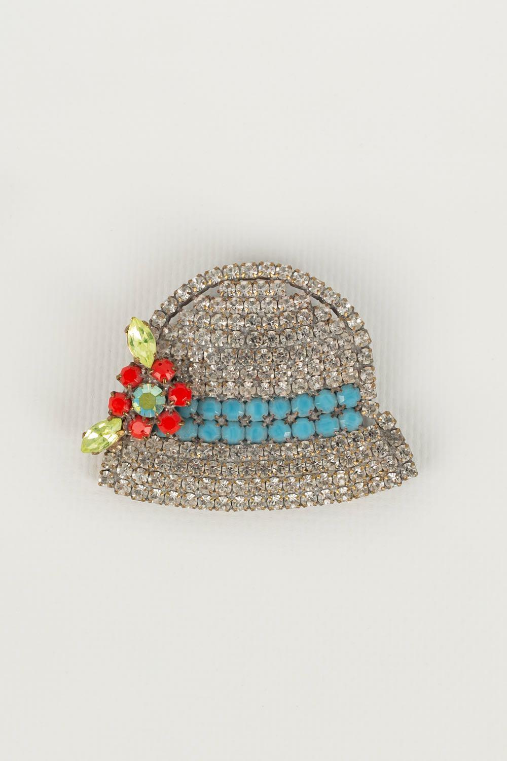 ANONYMOUS - Silver plated metal brooch with rhinestones.

Condition:
Good condition

Dimensions:
Height: 6 cm

SKU:BR30