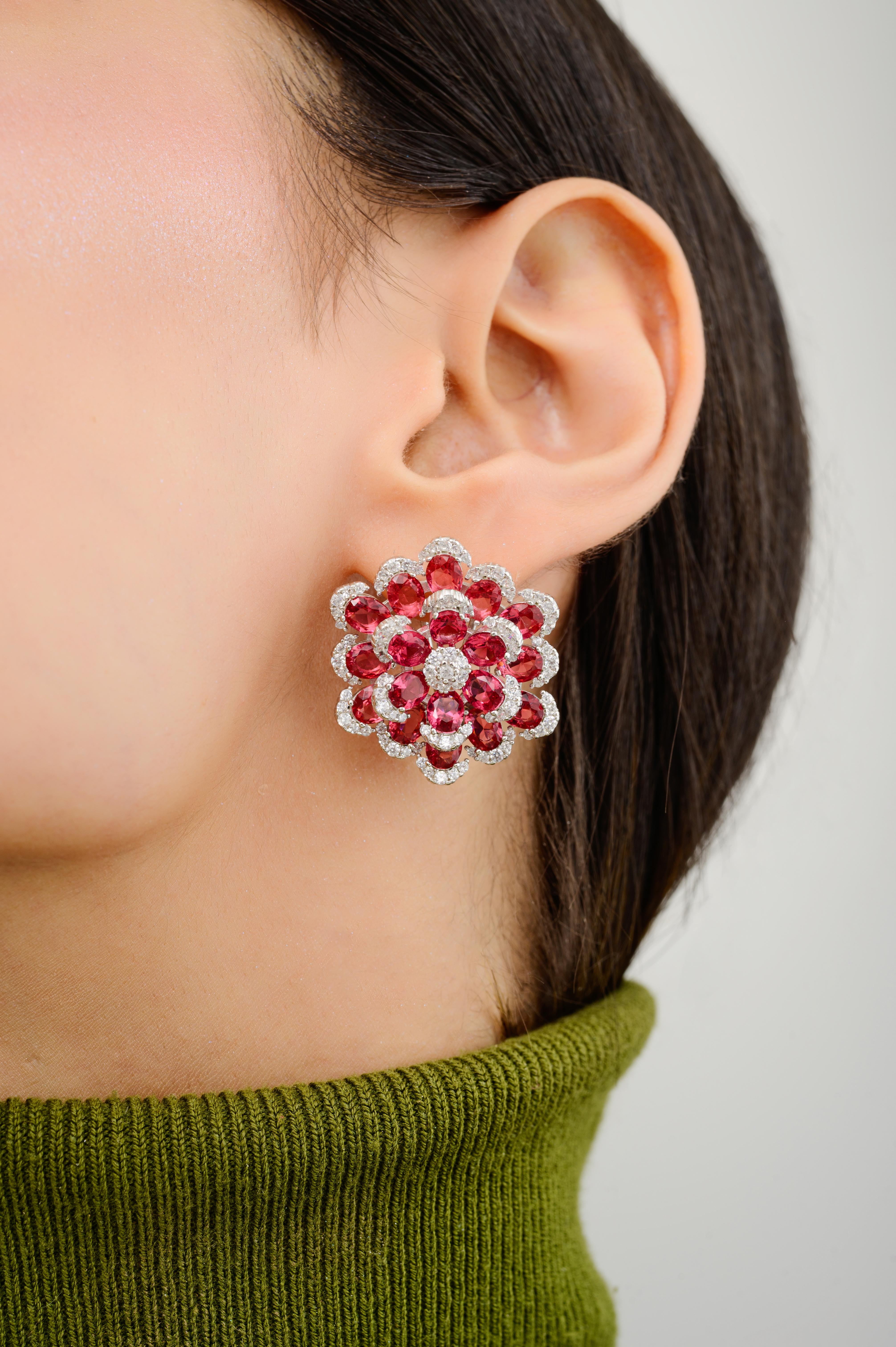 Rhinestone Redcolor Flower Pushback Stud Earrings in sterling silver. You shall need these statement stud earrings to make a statement with your look. Each piece features dazzling cubic zirconia stones, renowned for their brilliance and clarity, set