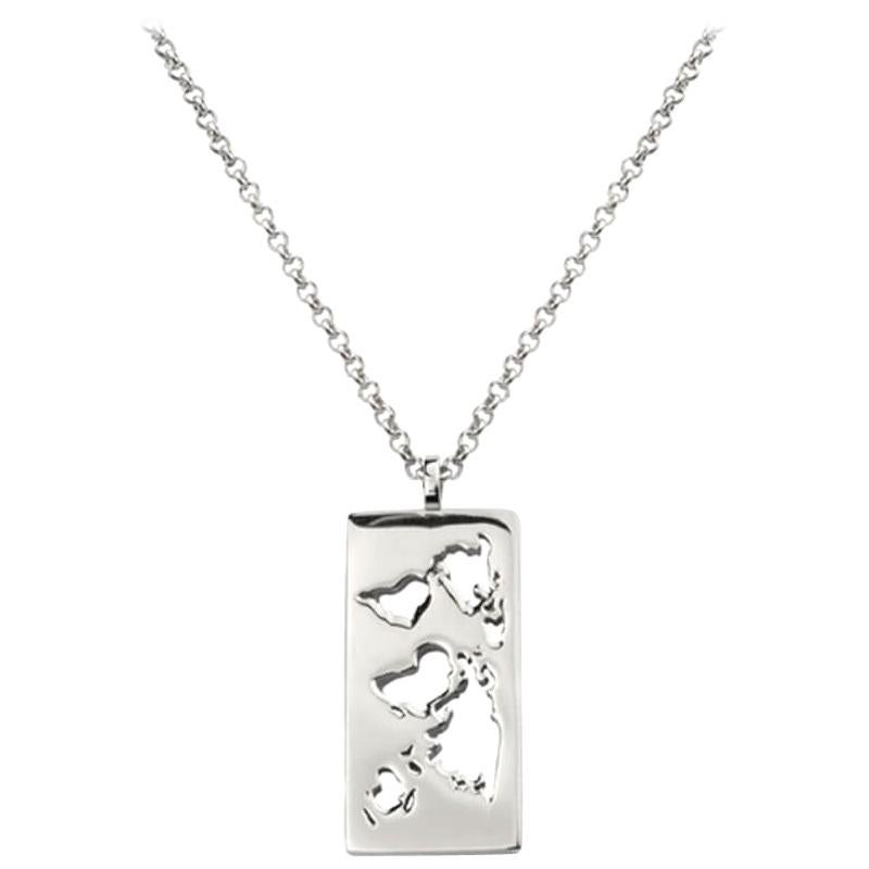 Rhodium Map Necklace with Laser Cutout World Pendant by Cristina Ramella For Sale