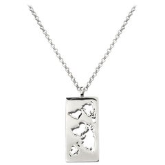 Rhodium Map Necklace with Laser Cutout World Pendant by Cristina Ramella