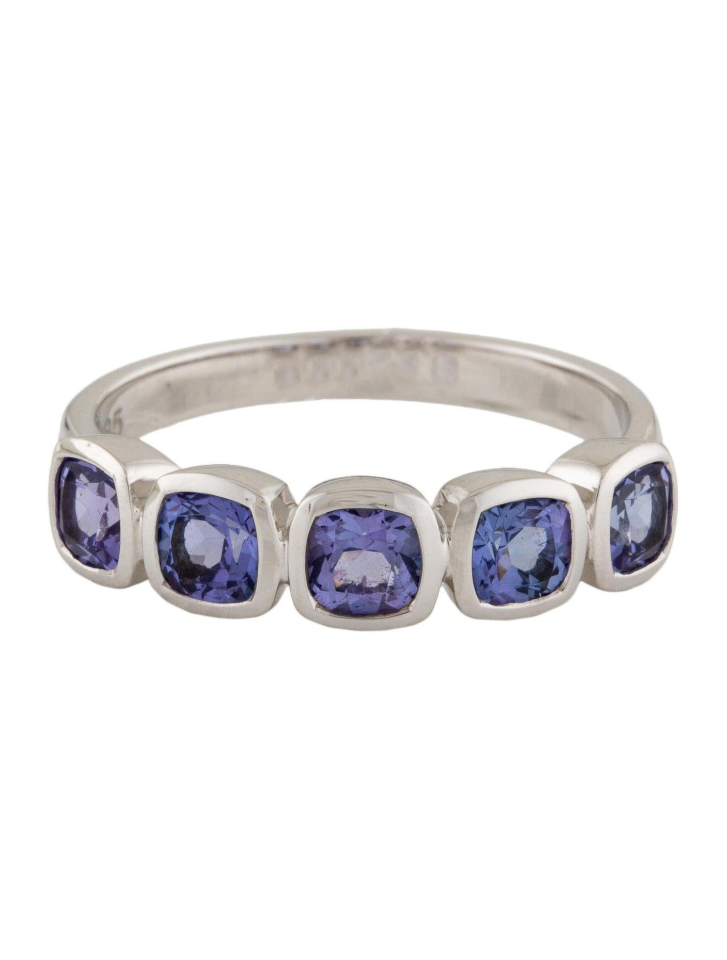 Discover the allure of this exquisite Rhodium-Plated 14K White Gold Tanzanite Band. Meticulously crafted, this stunning ring features a remarkable 1.50 carat tanzanite gemstone in a cushion brilliant cut, elegantly set in rhodium-plated 14K white