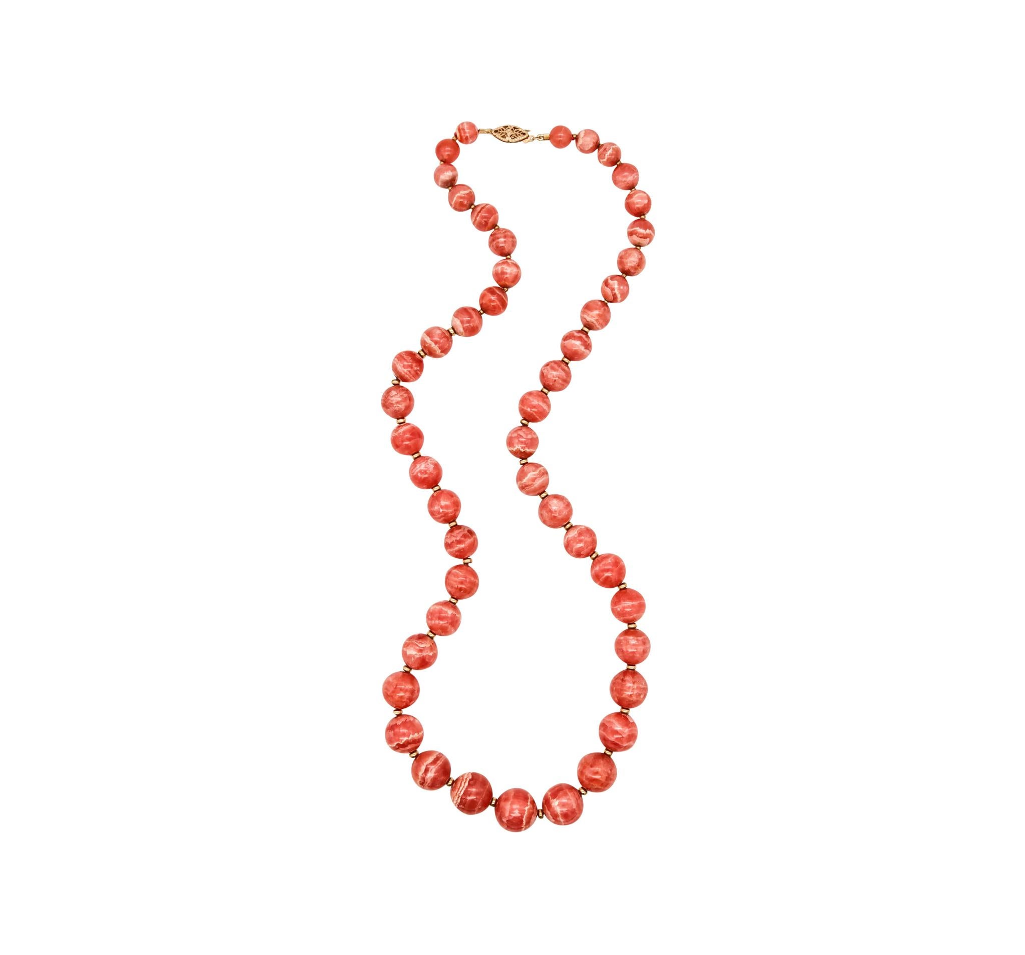 Magnificent necklace with Gradated Rhodochrosite.

Stunning sleek piece created, with super gem quality of gradated Rhodochrosite (8 mm to 15 mm). This necklace is composed by 48 spheres, perfectly carved from natural Argentinian reddish pink