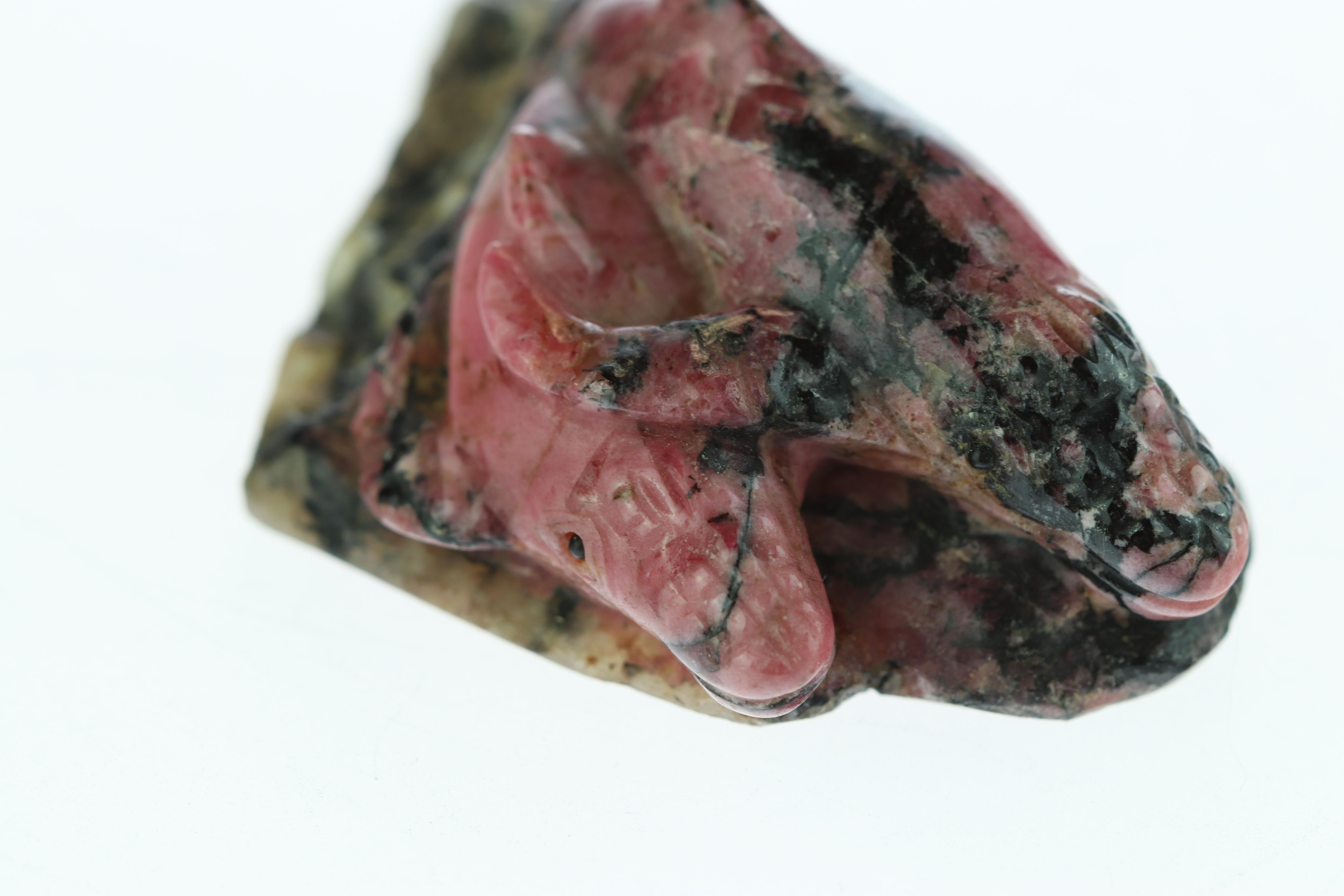 A natural scene hand carved in a natural precious stone with a mineral quartz base, what can you ask more? This collection features first quality rhodocrosite worked directly in its matrix rock stone, setting the tone for a vivid, realistic art