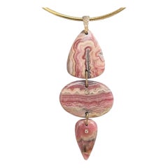 Ciondolo triplo in rodocrosite con diamanti